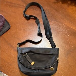 lululemon athletica Black Crossbody Bag with Gold Accents